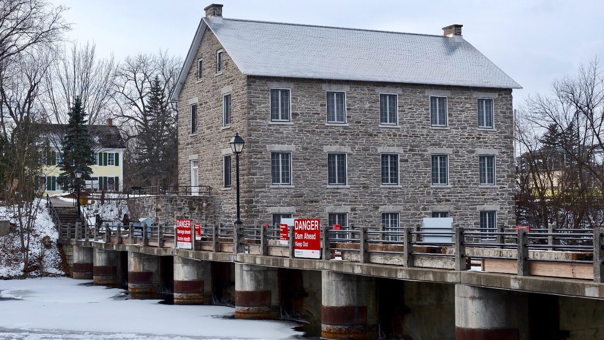Watson's Mill and the dam at Manotick in winter